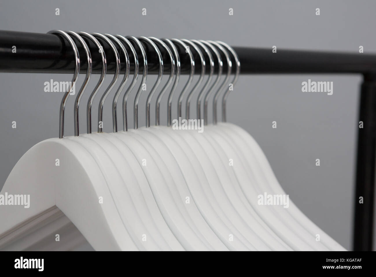 Close-up of empty cloth hangers Stock Photo - Alamy