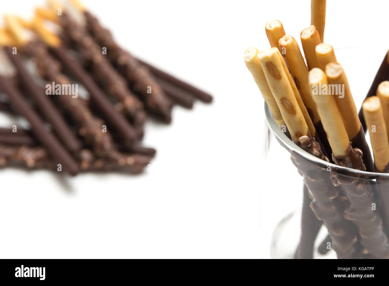 Chocolate Filled Biscuit Sticks on White Background Stock Photo
