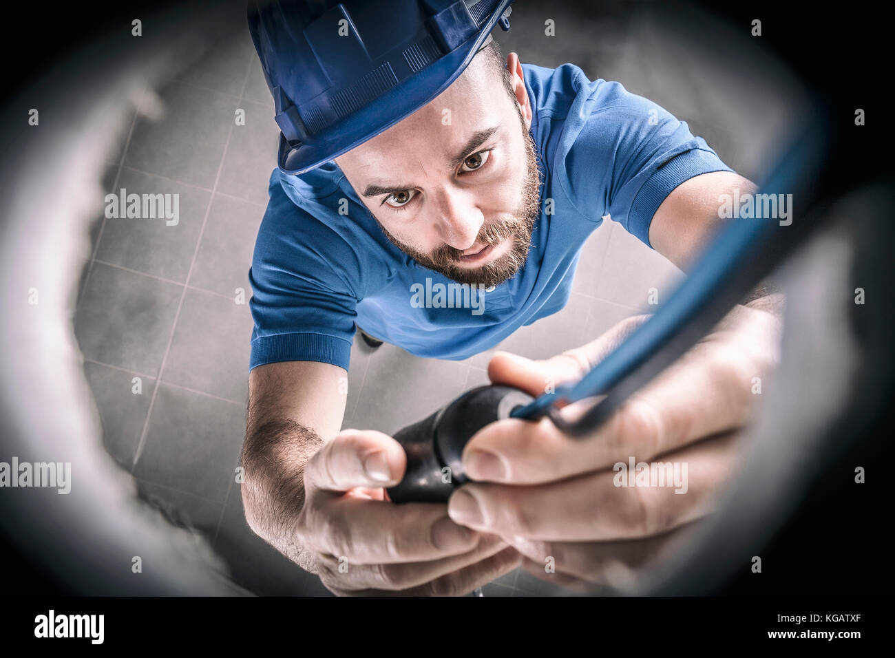 portrait of caucasian electrician at work Stock Photo