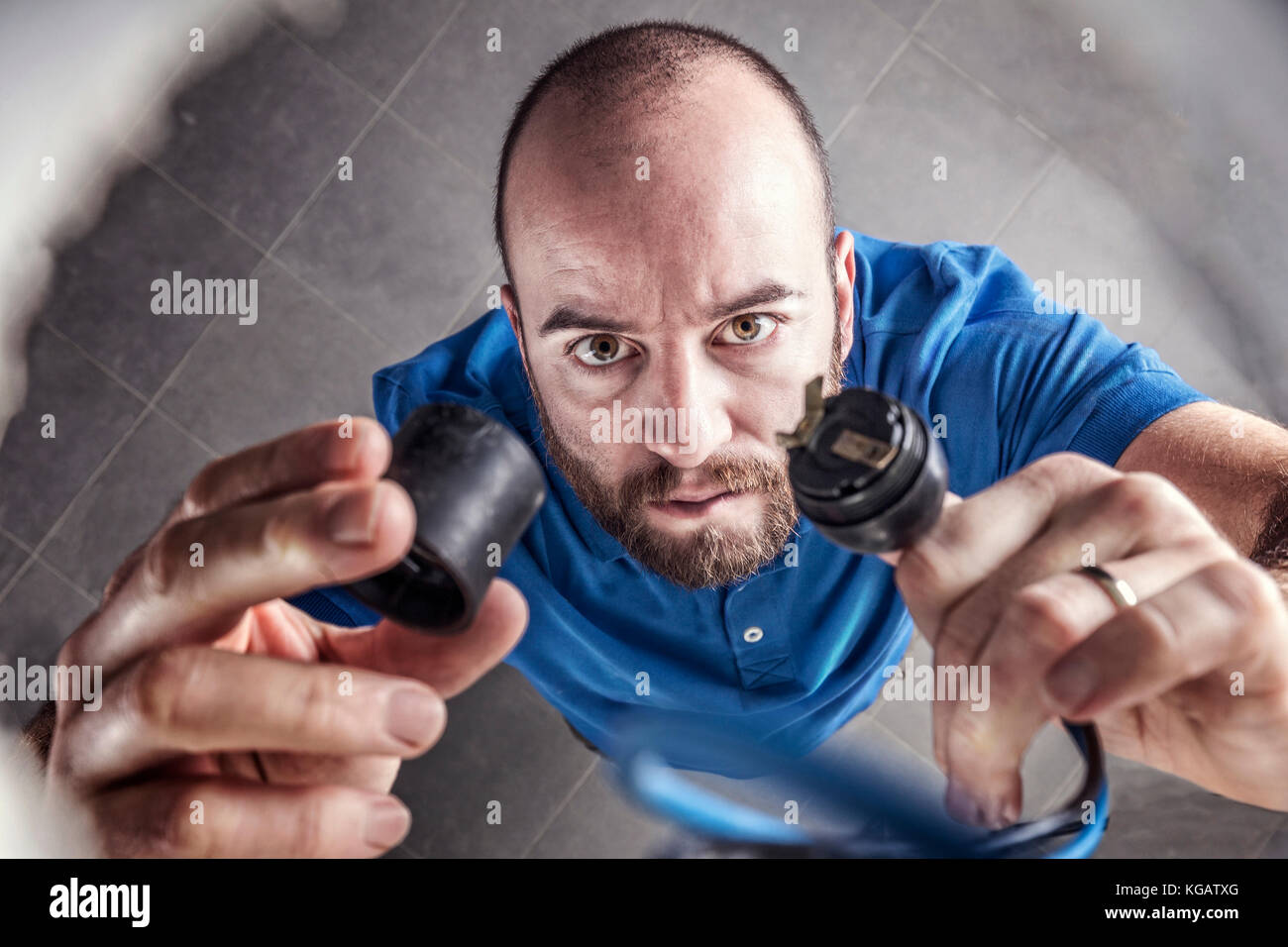 portrait of caucasian electrician at work Stock Photo