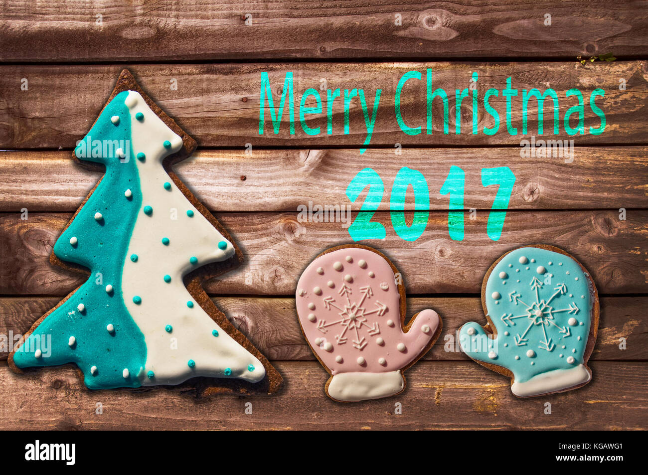 2018 christmas gingerbread cookies on wood greeting card Stock Photo