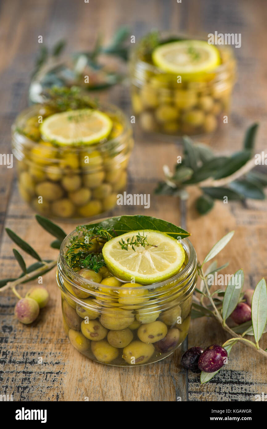 Green olives preserved in jar, preserve Stock Photo Alamy