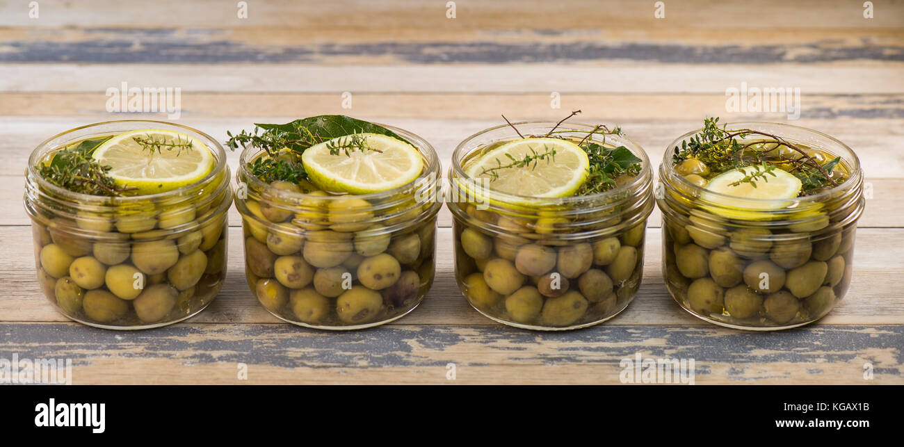 Green olives preserved in jar, preserve Stock Photo Alamy