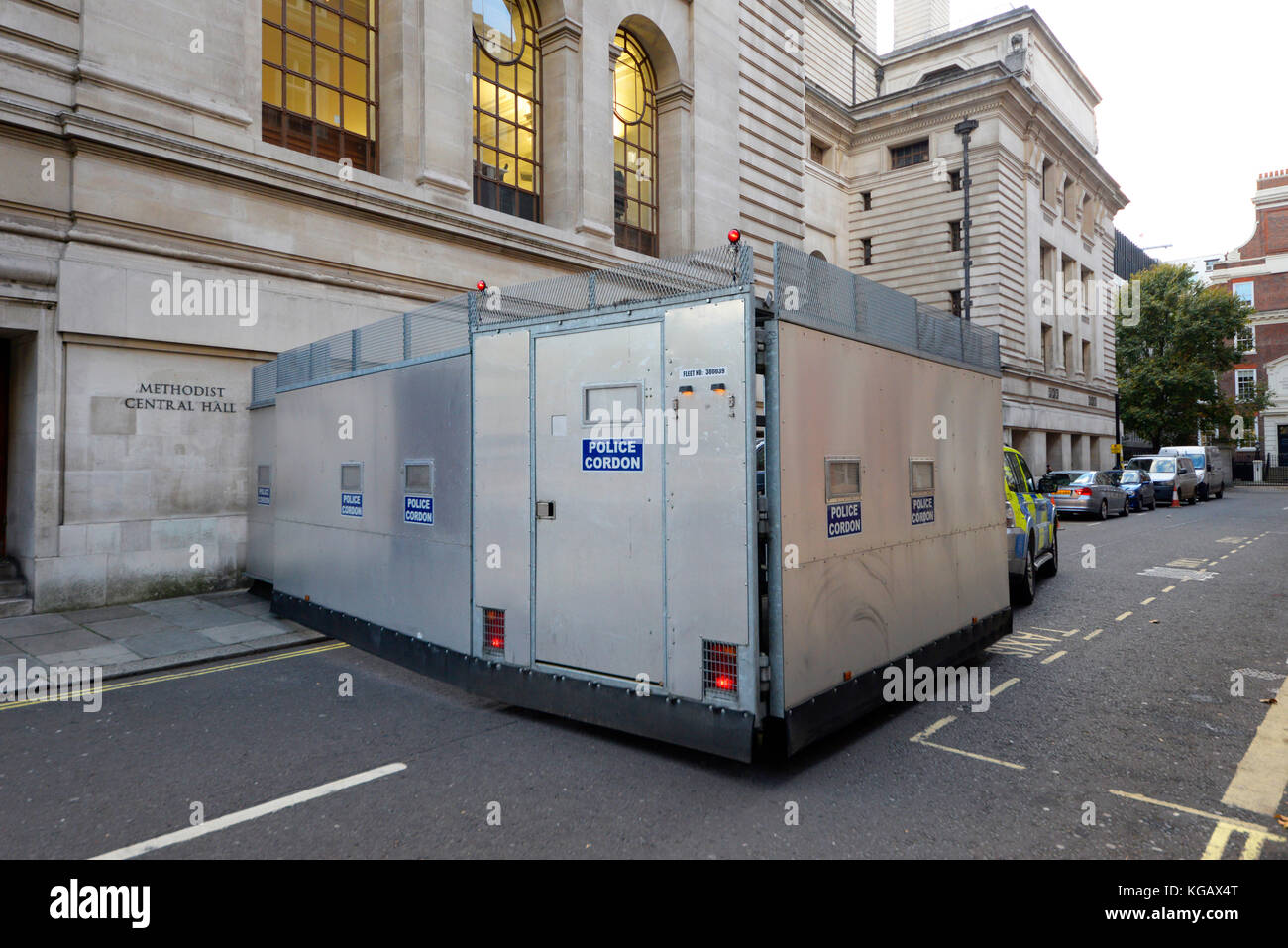 Police cordon trailer. Mobile cordon that can be towed into position. Protecting Methodist Central Hall, Westminster, London during protest march Stock Photo