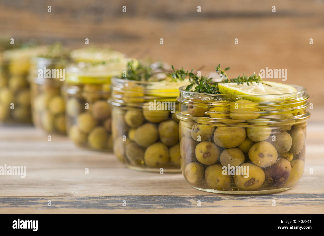 Green olives preserved in jar, preserve Stock Photo Alamy