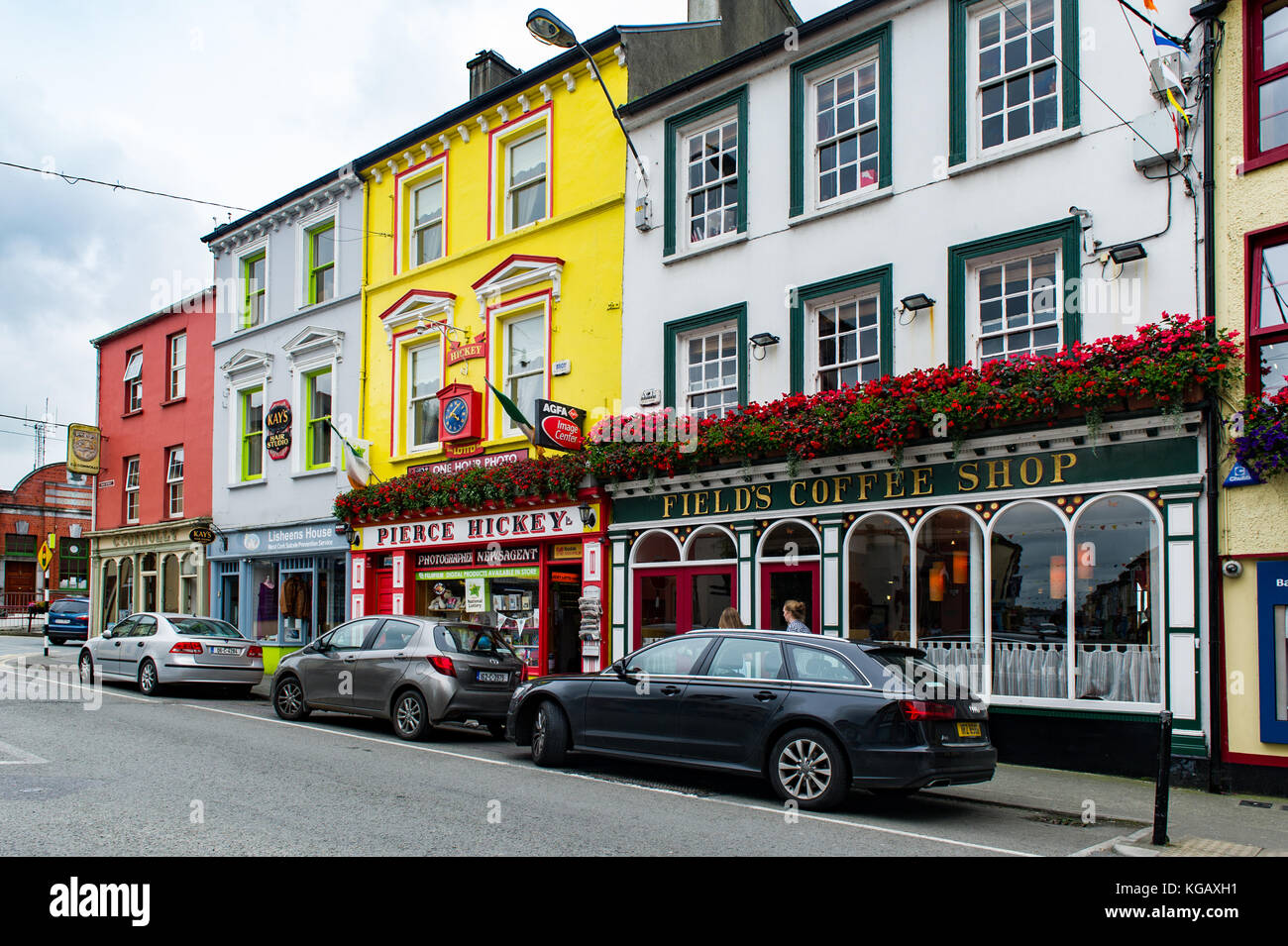 Skibbereen Main Street, Skibbereen, West Cork, Ireland with Fields Coffee Shop and Pierce Hickey Newsagents. Stock Photo