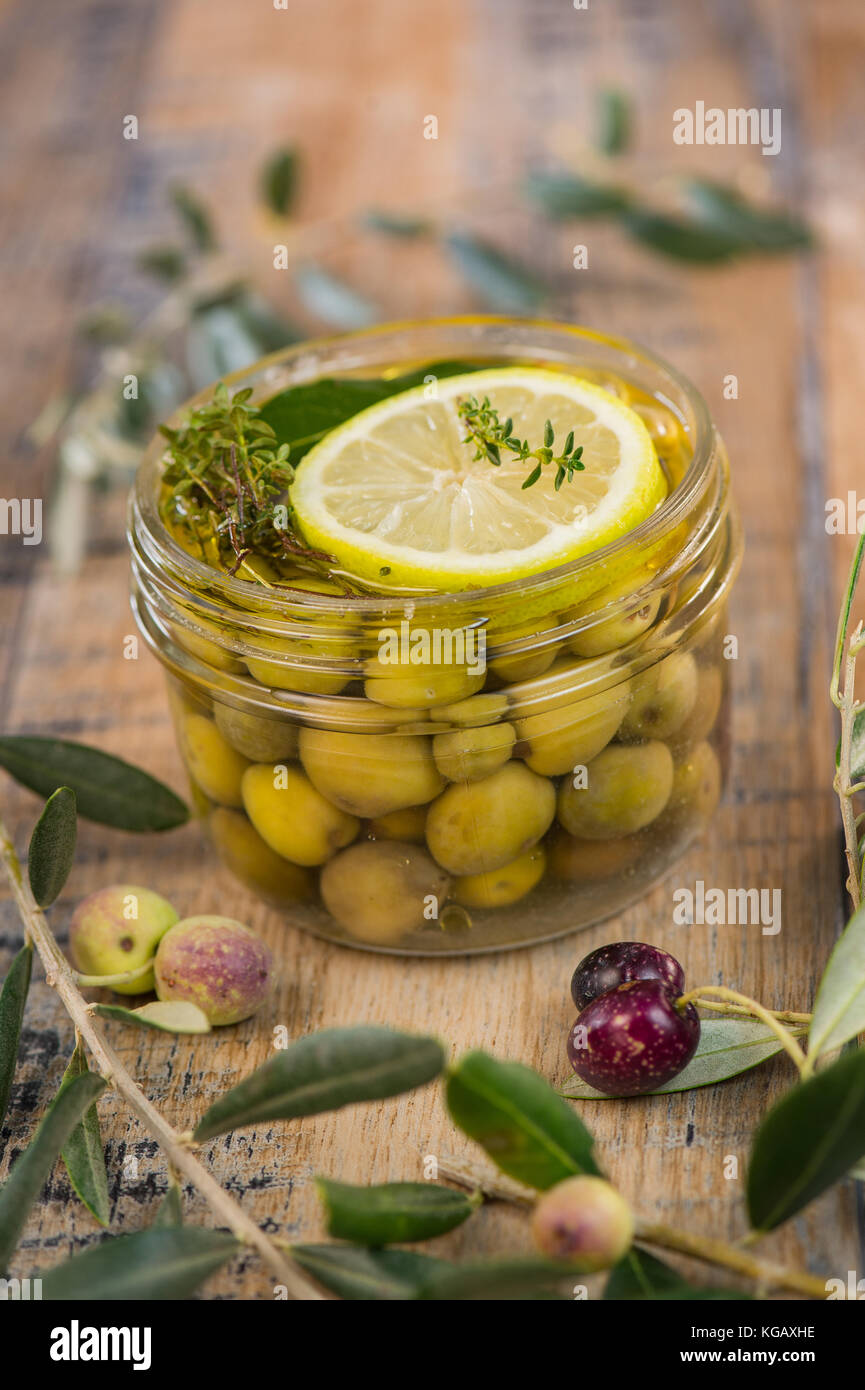 Green olives preserved in jar, preserve Stock Photo Alamy