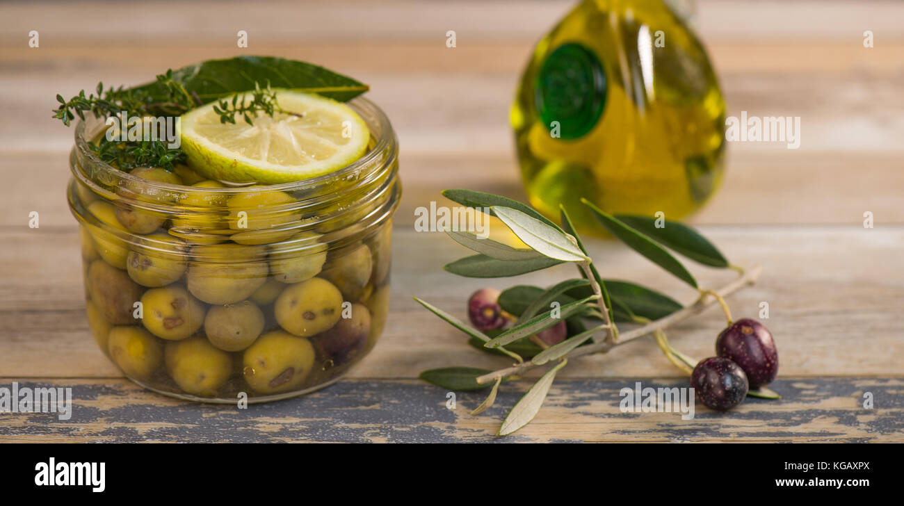 Green olives preserved in jar, preserve Stock Photo Alamy