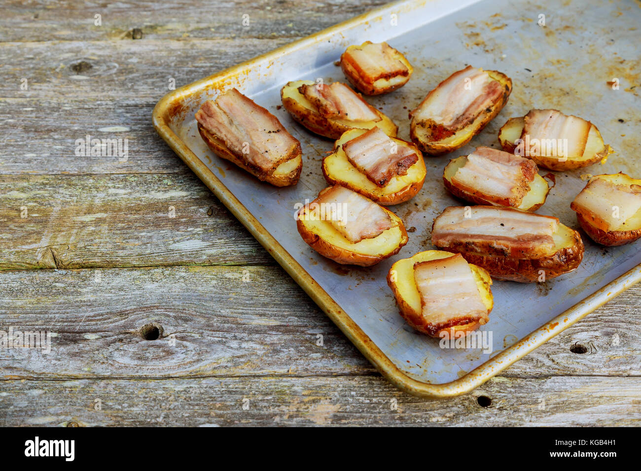 Fat of pork with baked potatoes baked with lard Stock Photo Alamy