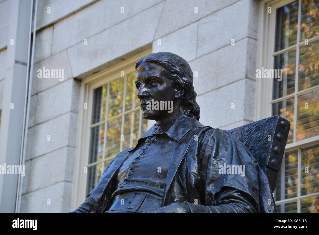 The famous John Harvard statue in Harvard Yard at Harvard University in