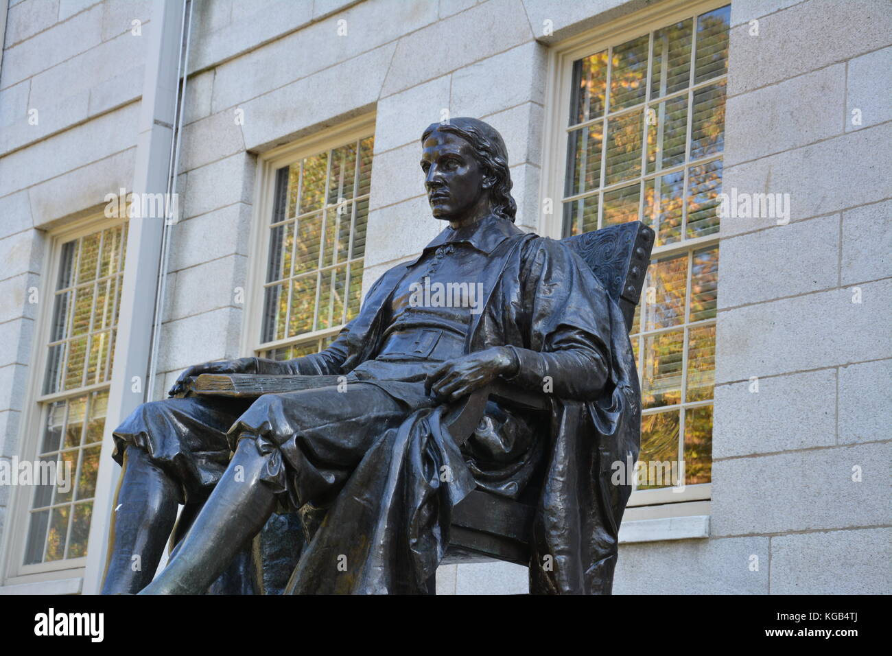 The famous John Harvard statue in Harvard Yard at Harvard University in