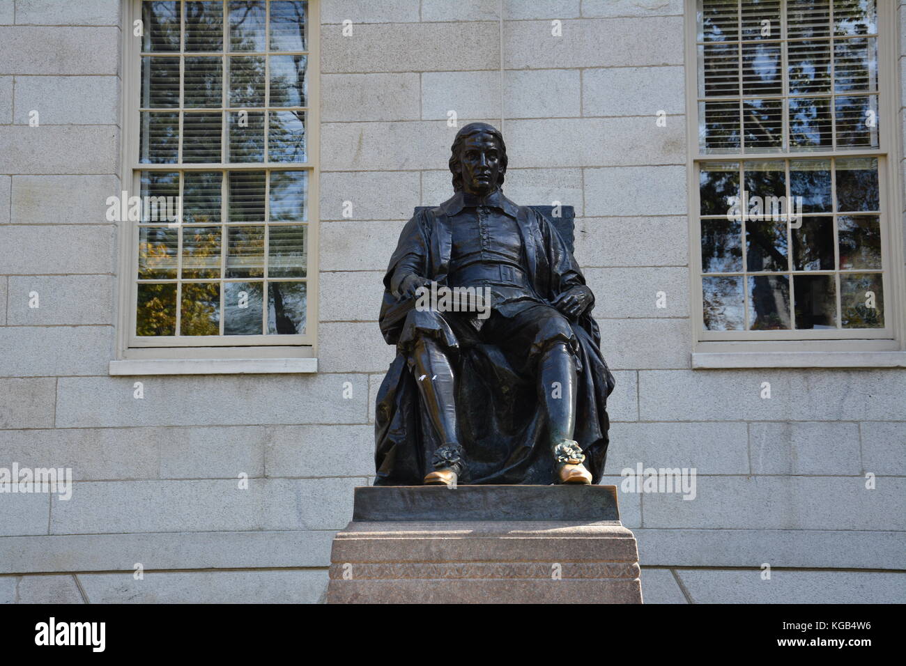 The famous John Harvard statue in Harvard Yard at Harvard University in