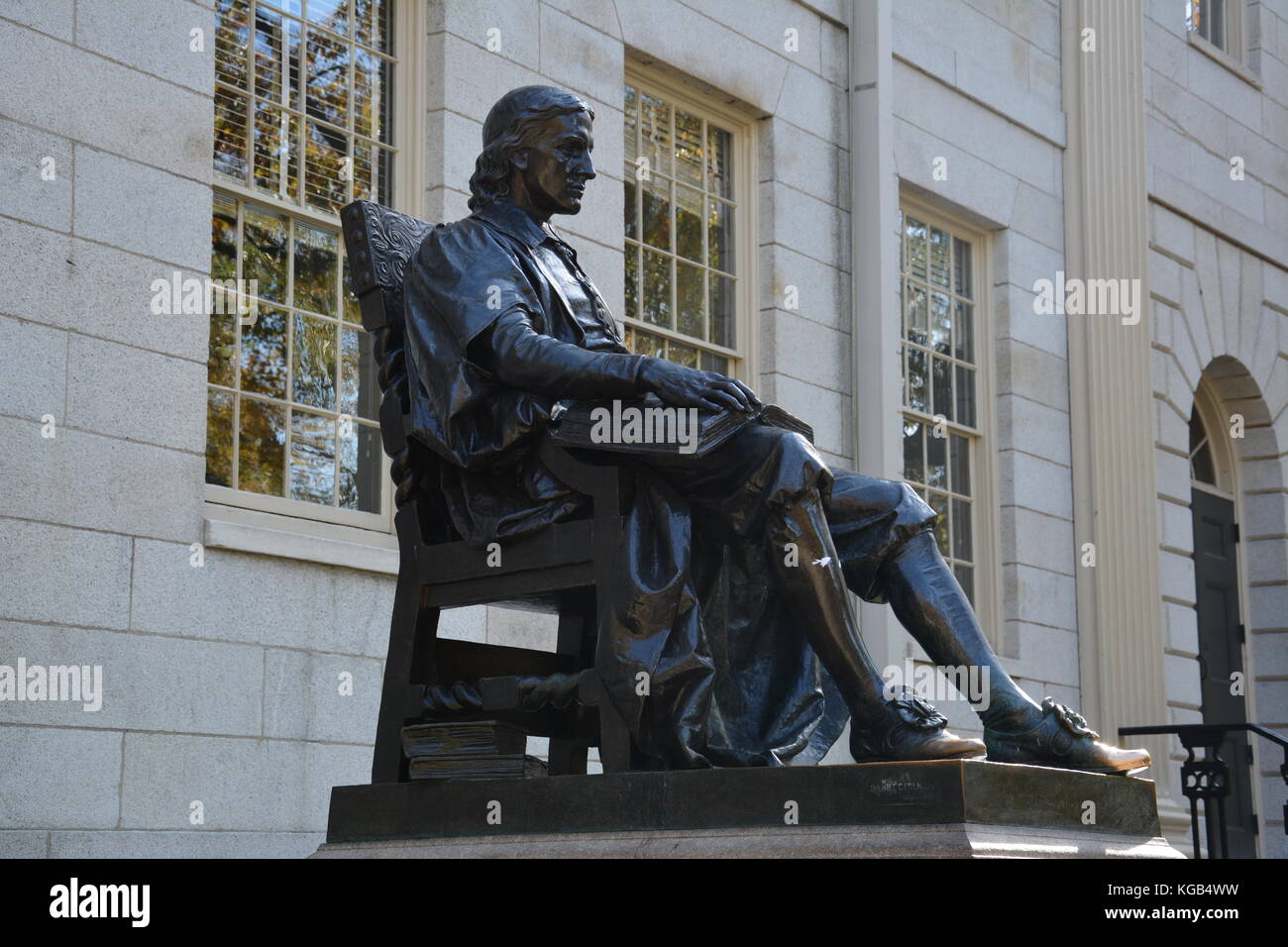 The famous John Harvard statue in Harvard Yard at Harvard University in