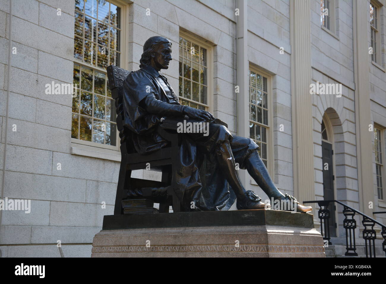 The famous John Harvard statue in Harvard Yard at Harvard University in