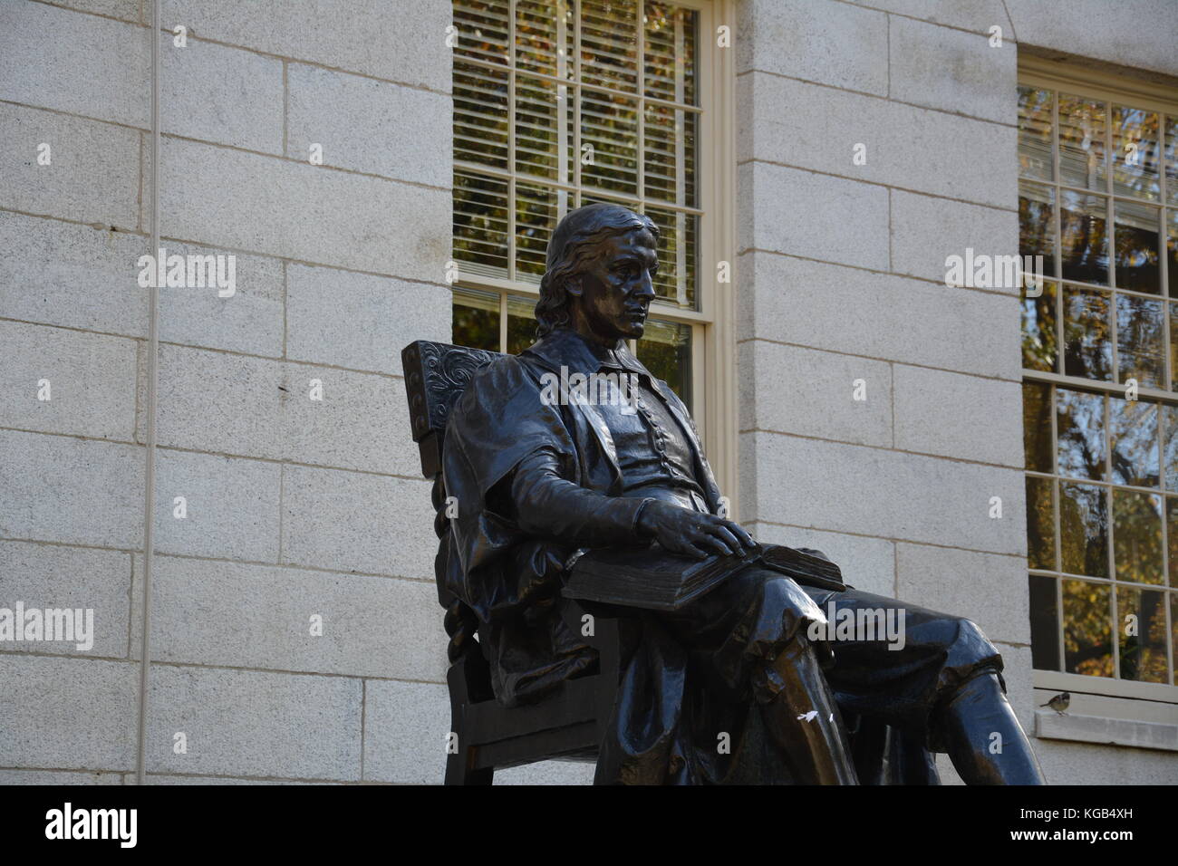 The famous John Harvard statue in Harvard Yard at Harvard University in