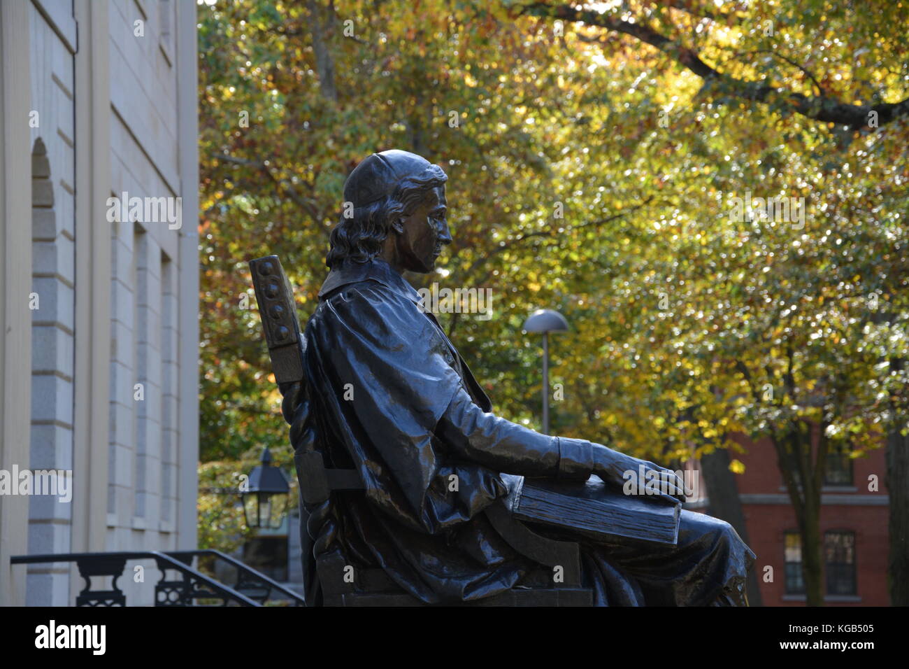 The famous John Harvard statue in Harvard Yard at Harvard University in