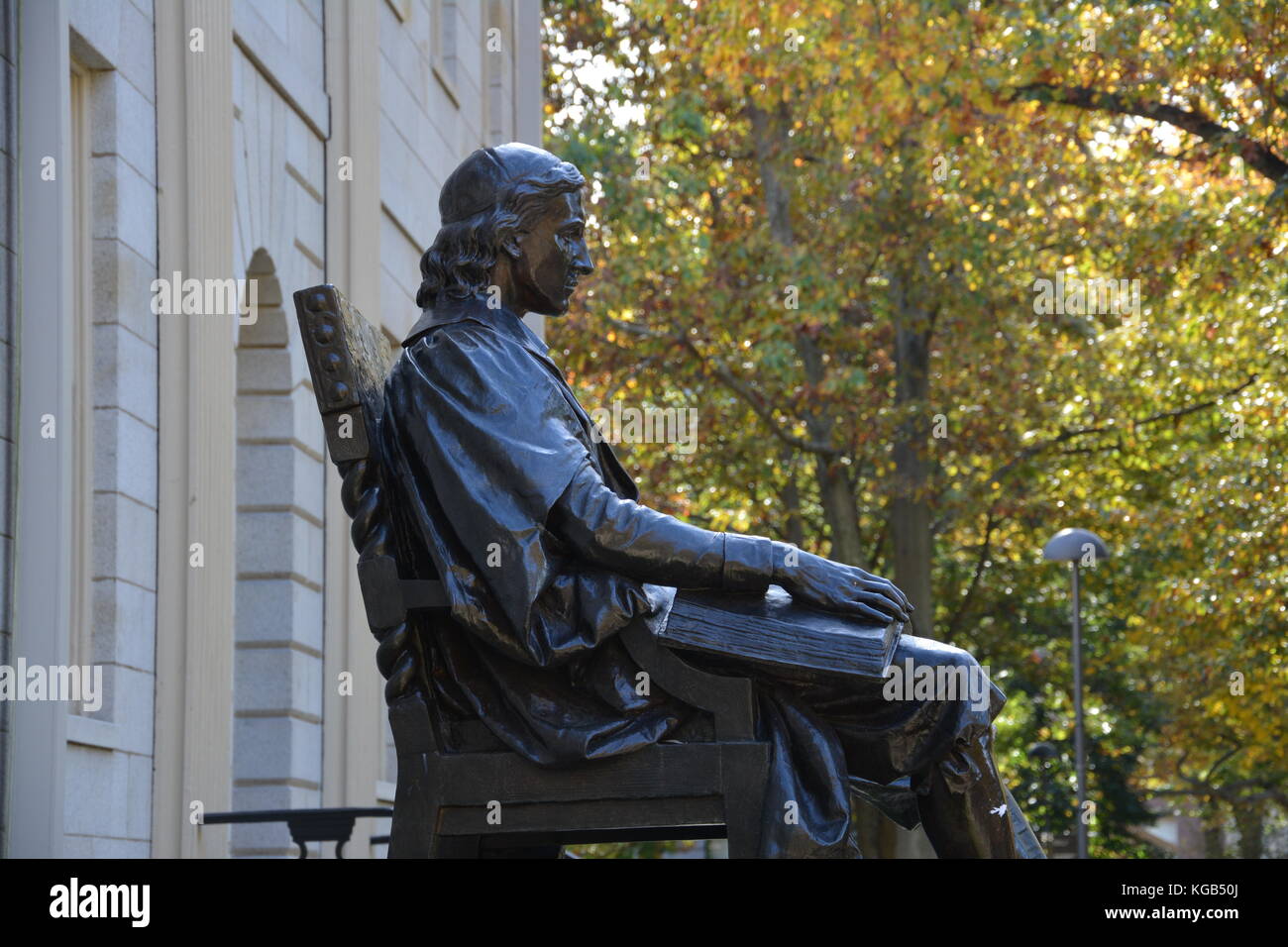 The famous John Harvard statue in Harvard Yard at Harvard University in
