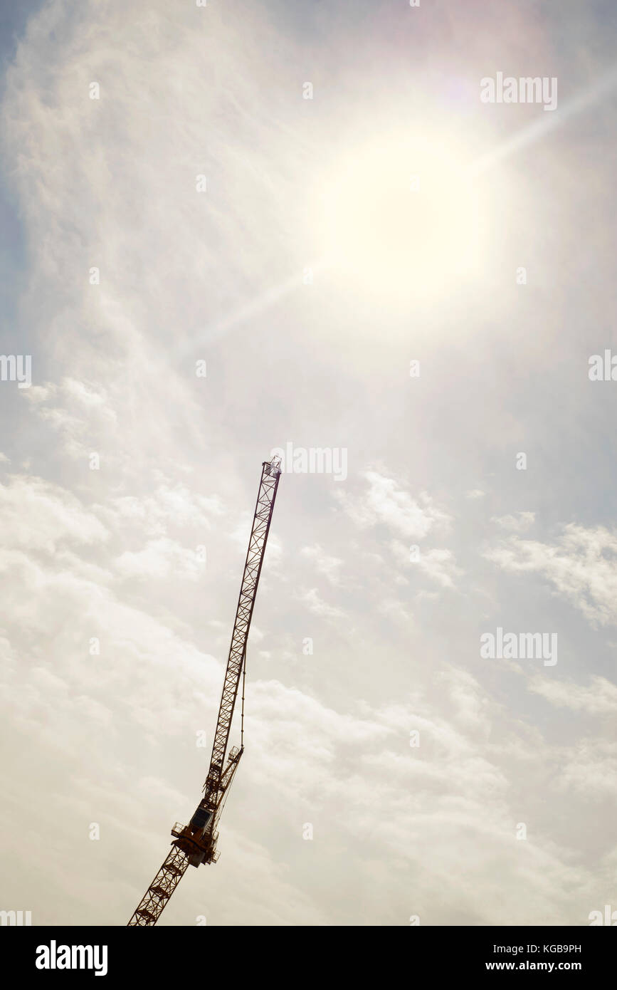 Silhouette of construction crane against the sunny sky Stock Photo - Alamy