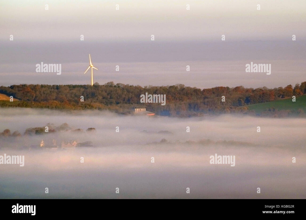 Lewes, East Sussex. 6th November 2017. A sea of mist surrounds the wind turbine above Glyndebourne Opera House, East Sussex, on a frosty but bright start to the week. © Peter Cripps/Alamy Live News Stock Photo
