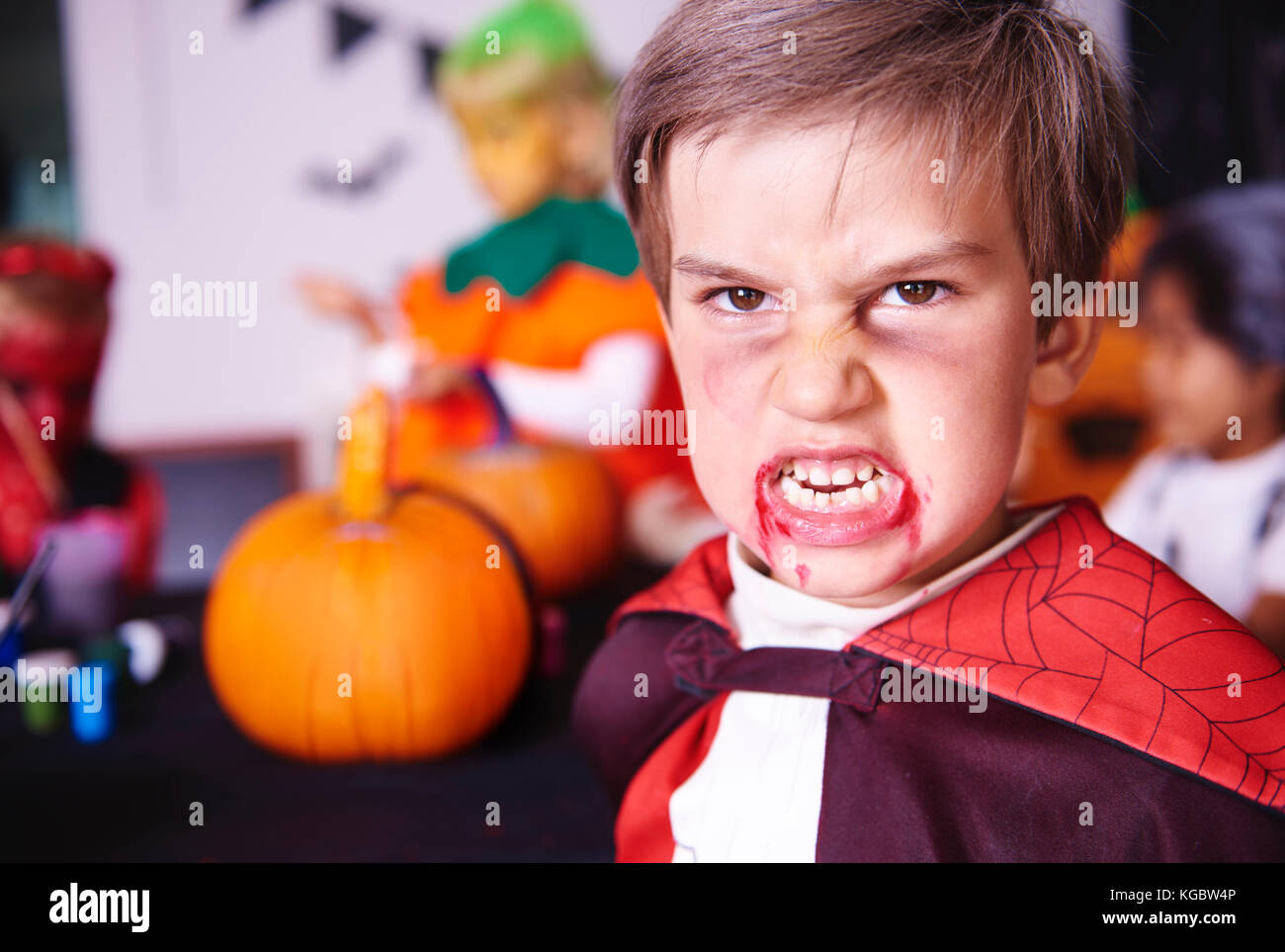 Portrait of boy dressed as a vampire Stock Photo