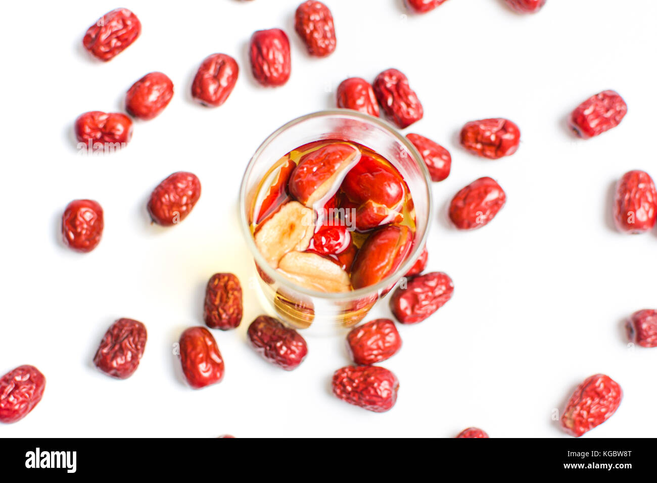 Chinese red dates fruit tea in a glass on white Stock Photo