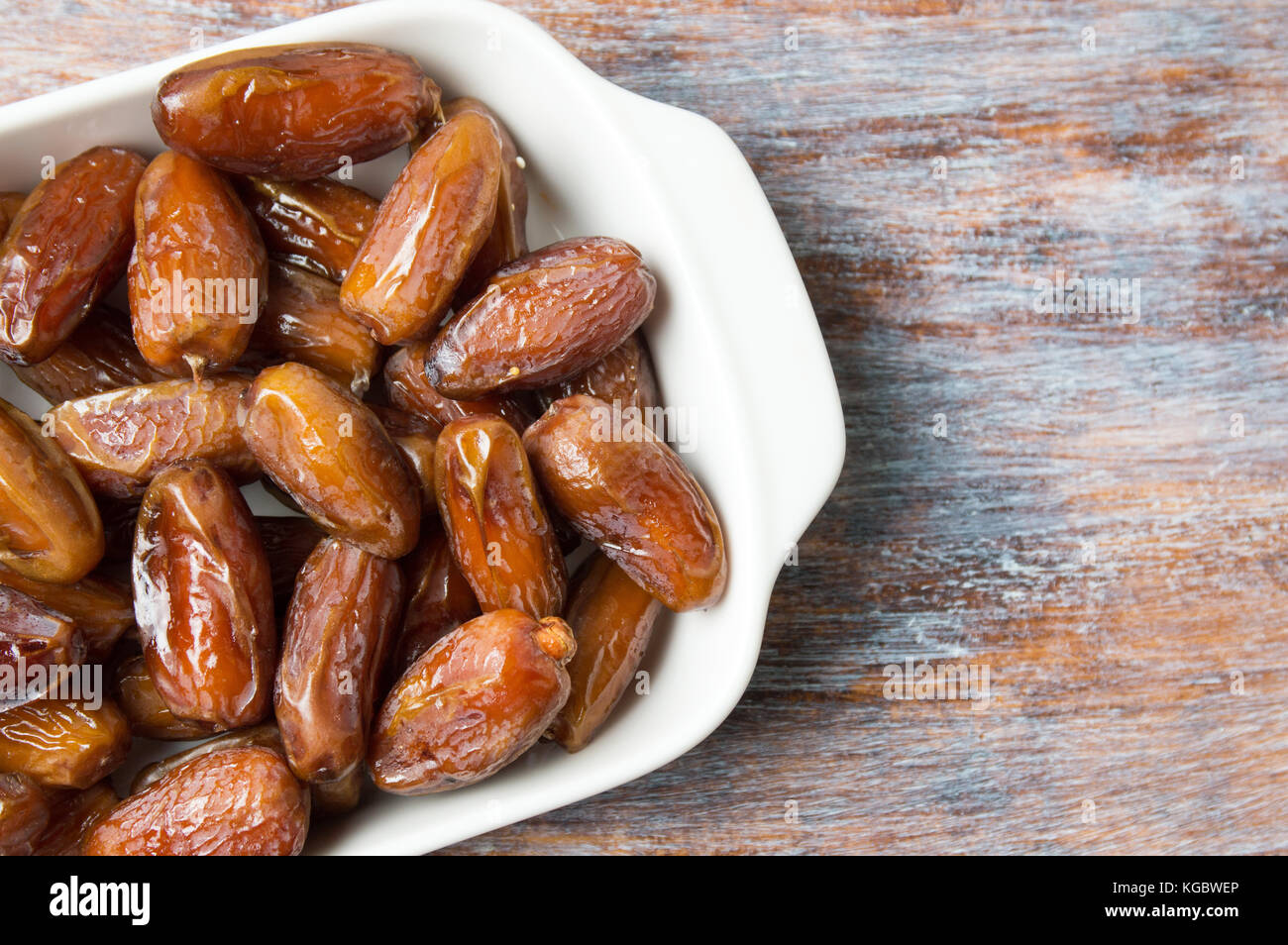 Bunch of dried date fruits on a plate Stock Photo