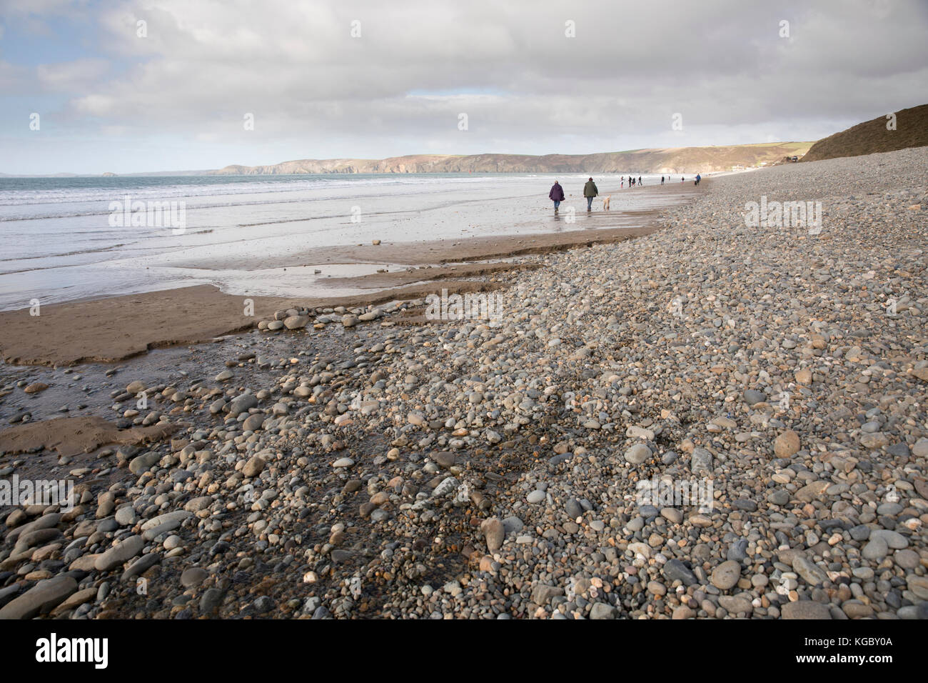 Autumn Walkers on  Newgale, Pembrokeshire, Wales. Stock Photo