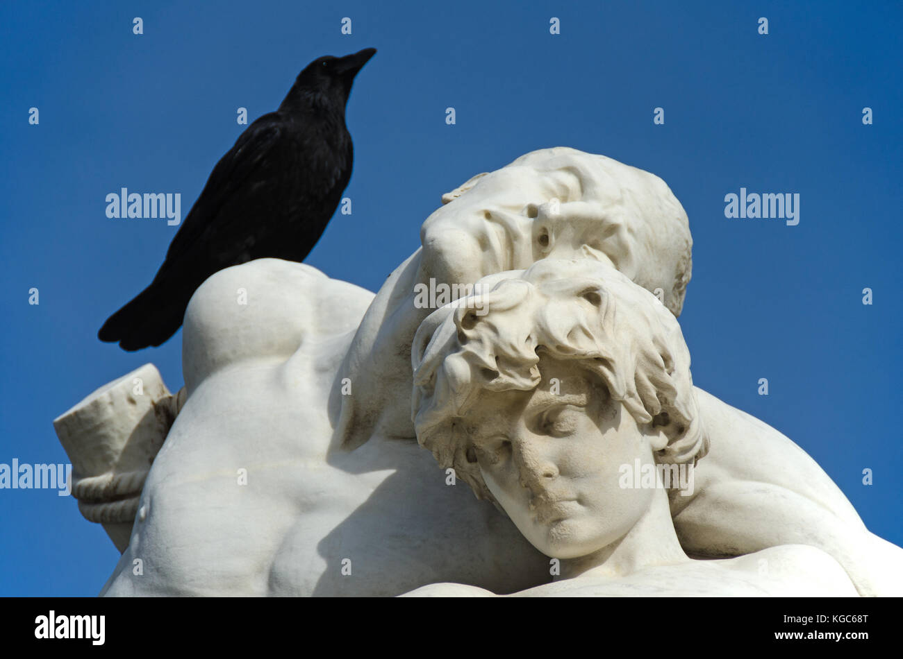 Paris, France. Jardin des Tuileries. Marble statue 'Le Serment de Spartacus' / 'The Oath of Spartacus' (c1870: Louis-Ernest Barrias) detail with crow Stock Photo