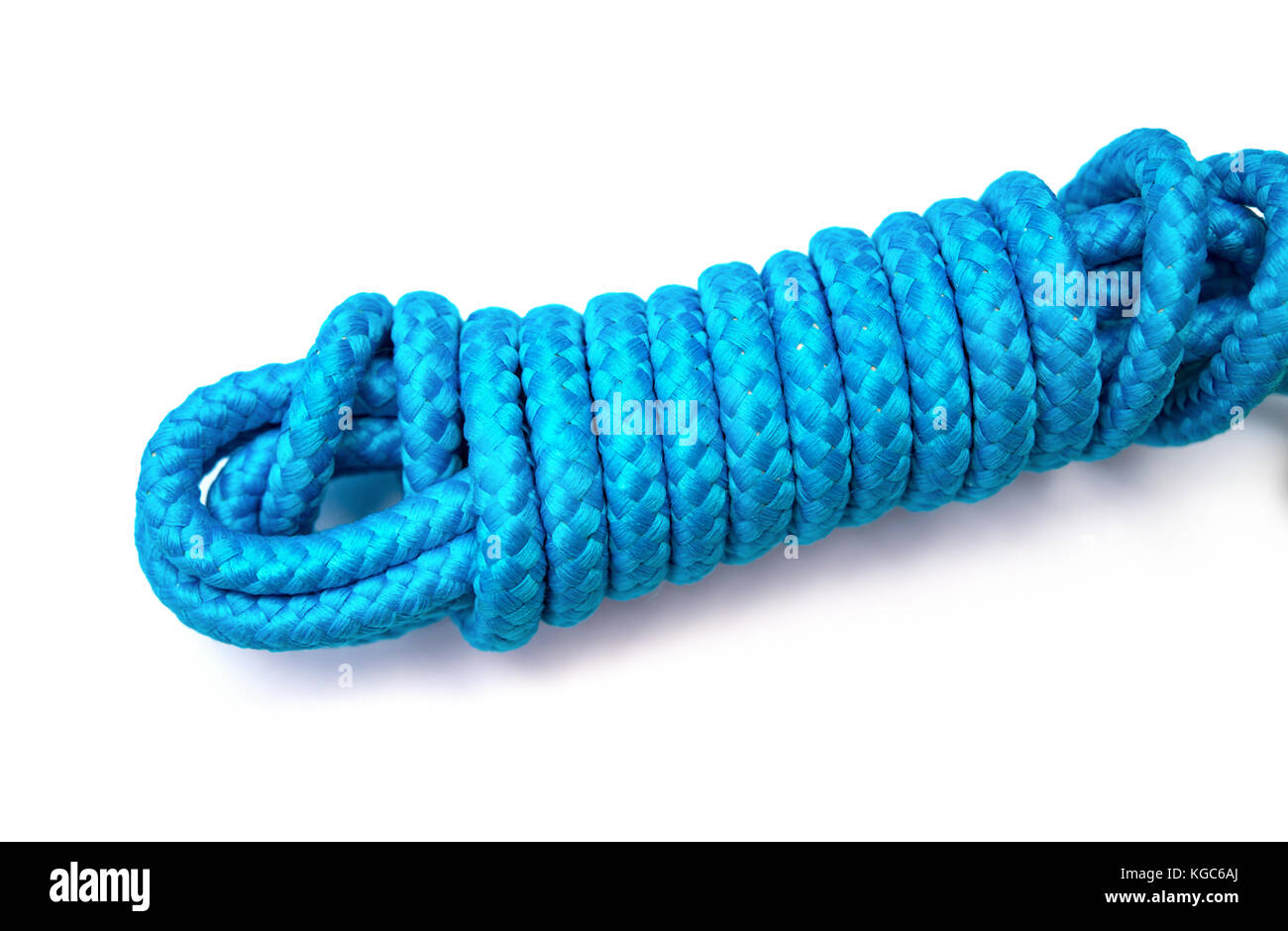tied up blue skipping rope on white background Stock Photo - Alamy