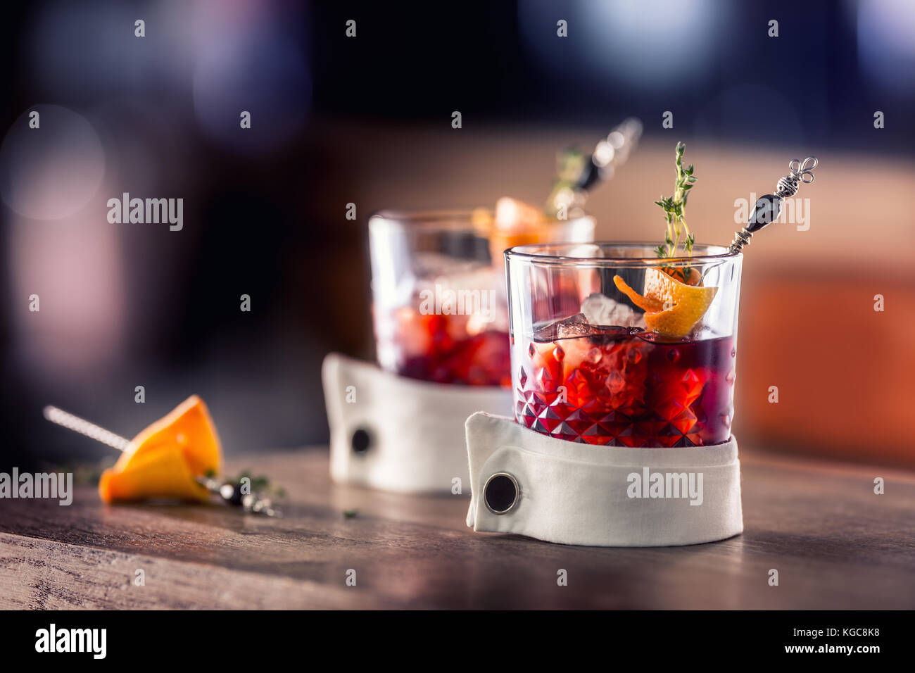 Fresh cocktail drink with ice fruit and herb decoration. Alcoholic, non