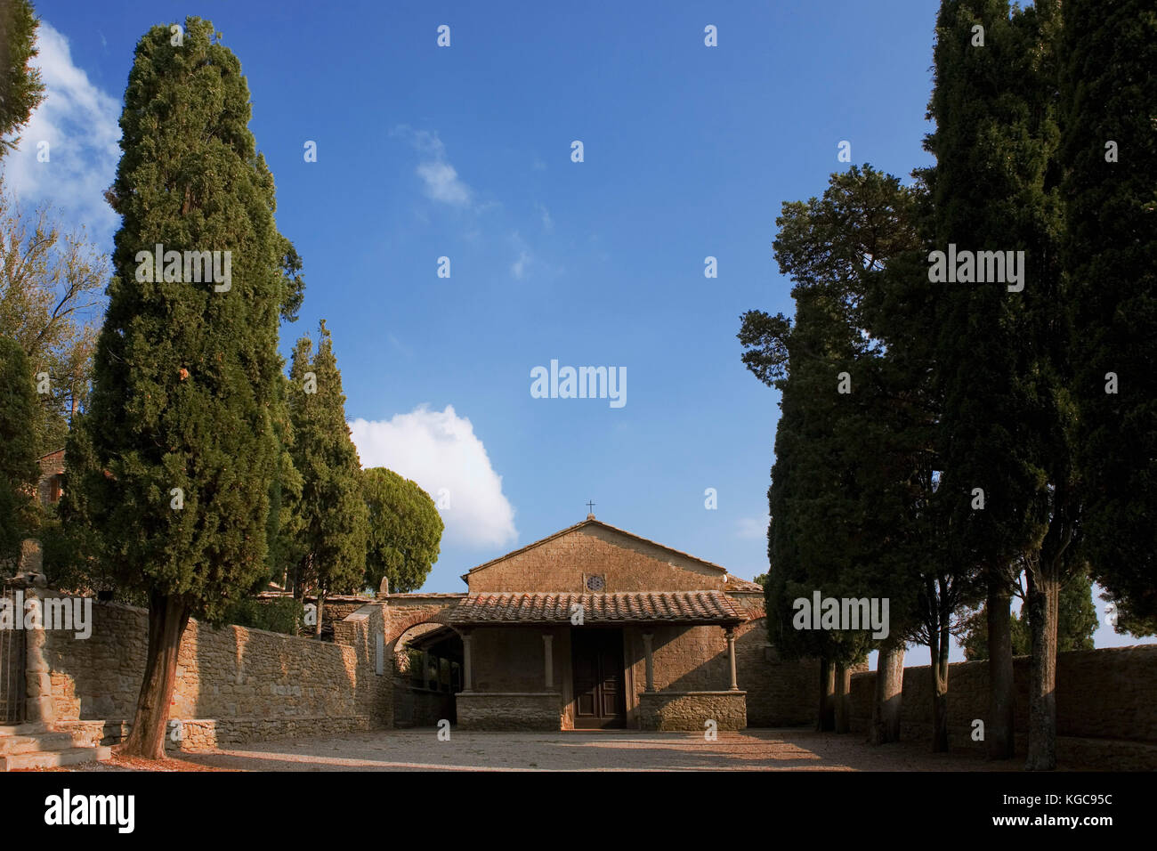 Chiesa San Niccolò, Cortona, Arezzo, Tuscany, Italy: a charming 15th church approached through a peaceful walled courtyard with cypresses Stock Photo
