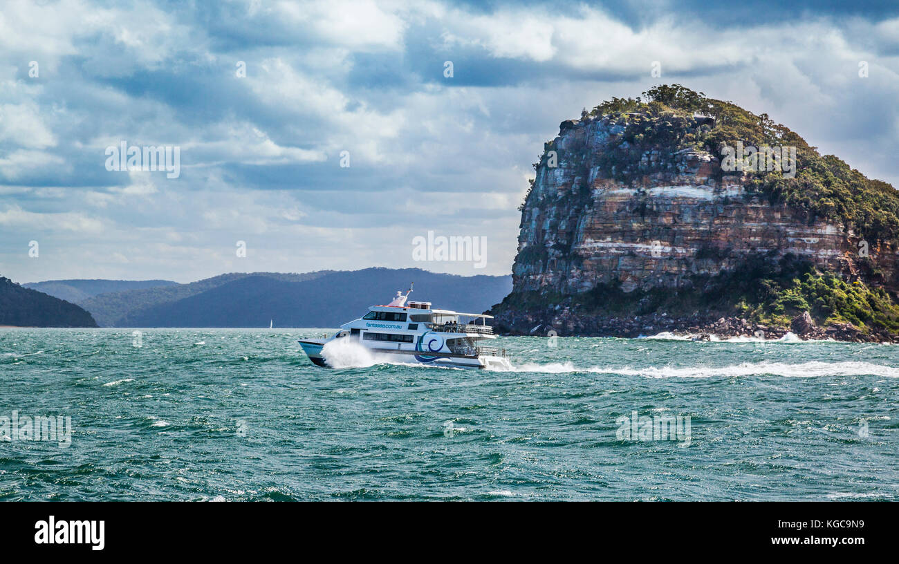 Australia, New South Wales, Central Coast, Broken Bay, Ettalong-Palm Beach ferry passes Lion Island Nature Reserve in the Hawkesbury River estuary. Stock Photo
