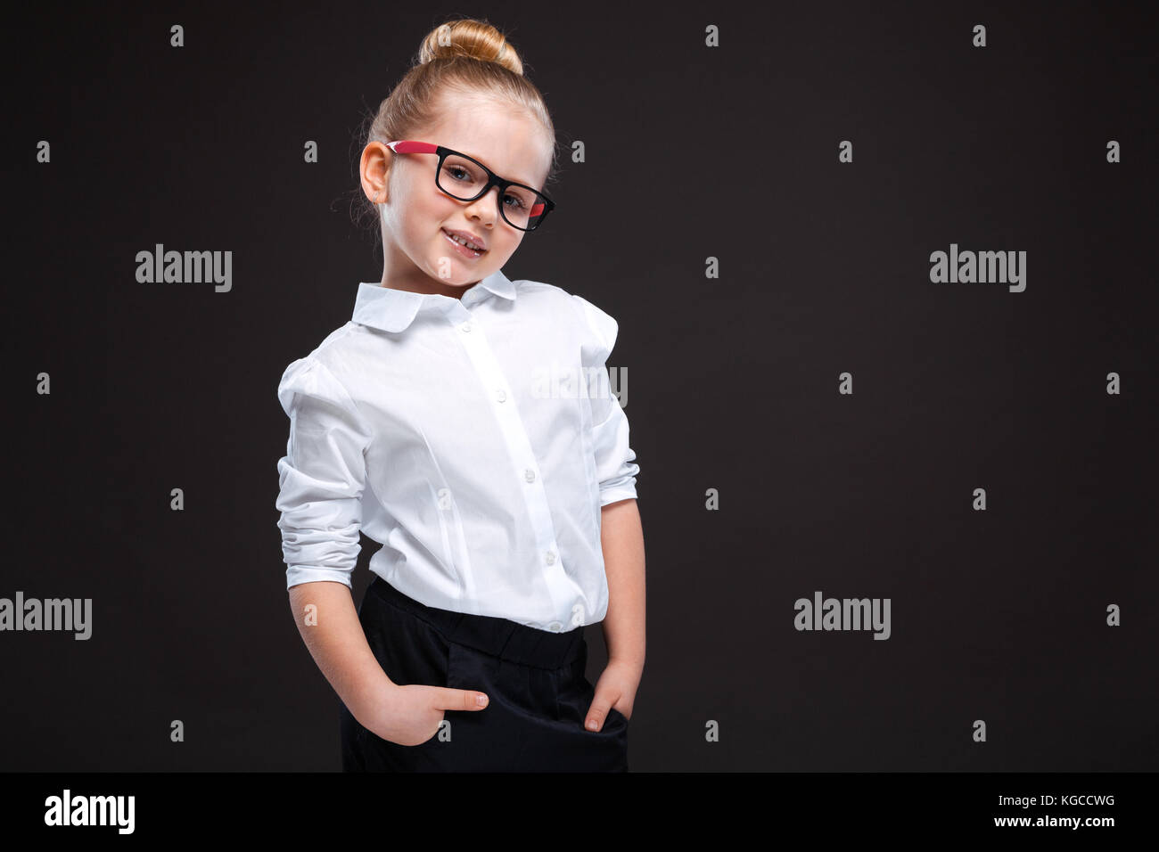 Cute young girl in white shirt and 