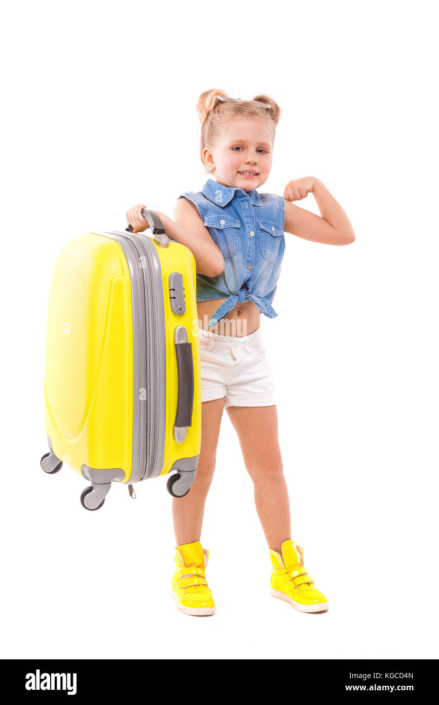 little girl in blue shirt, white shorts 
