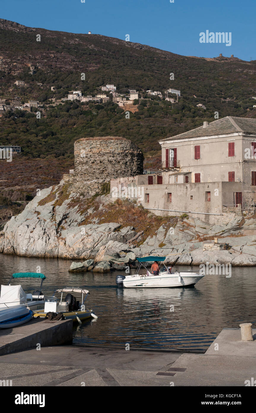 Corsica: panoramic view of the skyline of Centuri Port, the little harbour town on the Cap Corse peninsula, on the western side of Cap Corse Stock Photo