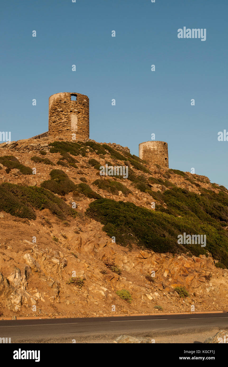 Corsica: sunset on the ruined Genoese Towers (16th century) at the northwestern end of Cap Corse, on the road between Botticella (Ersa) and Centuri Stock Photo