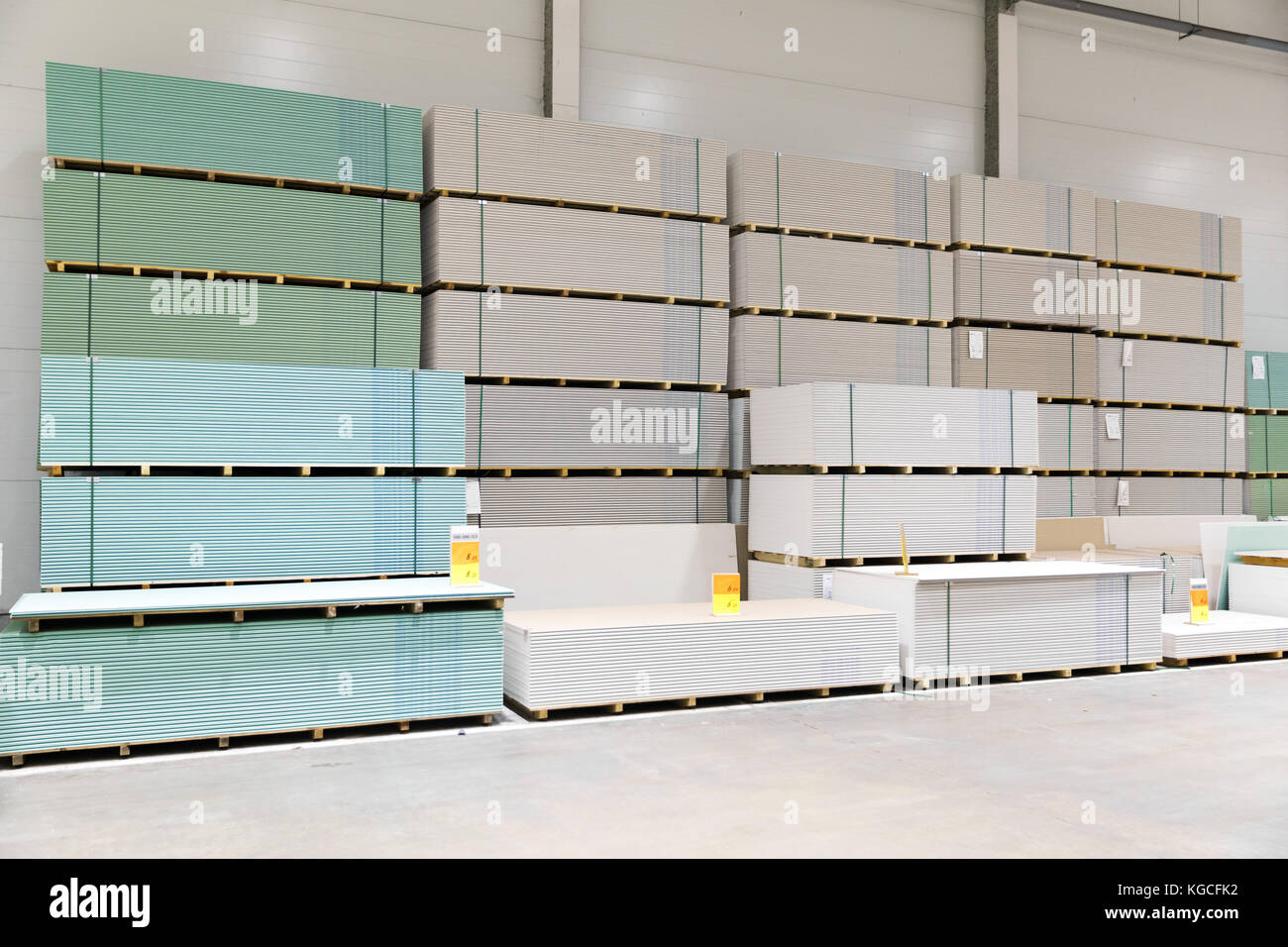 gypsum board stacks at indoor warehouse Stock Photo Alamy