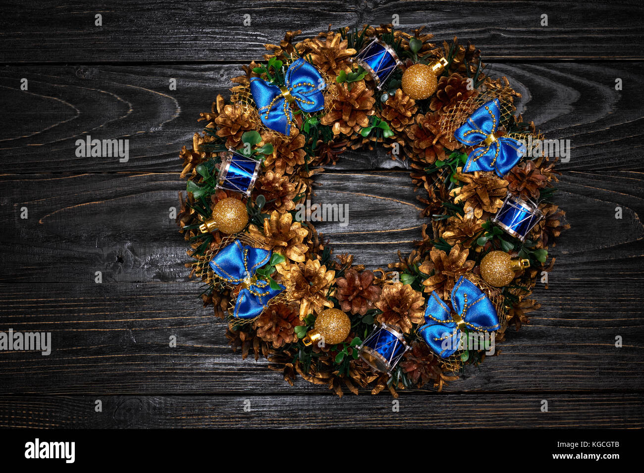 Christmas wreath on wooden background Stock Photo