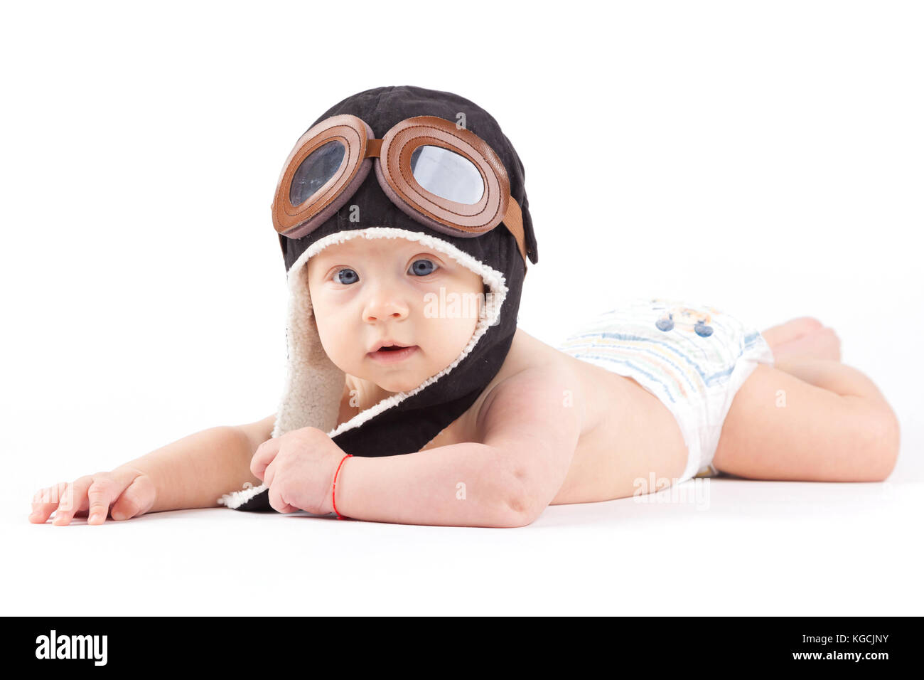 cute confused baby boy in diaper and 