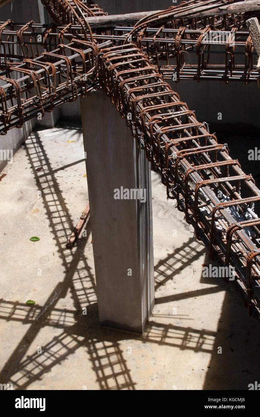 A concrete support with rebar for a new building in the Philippines