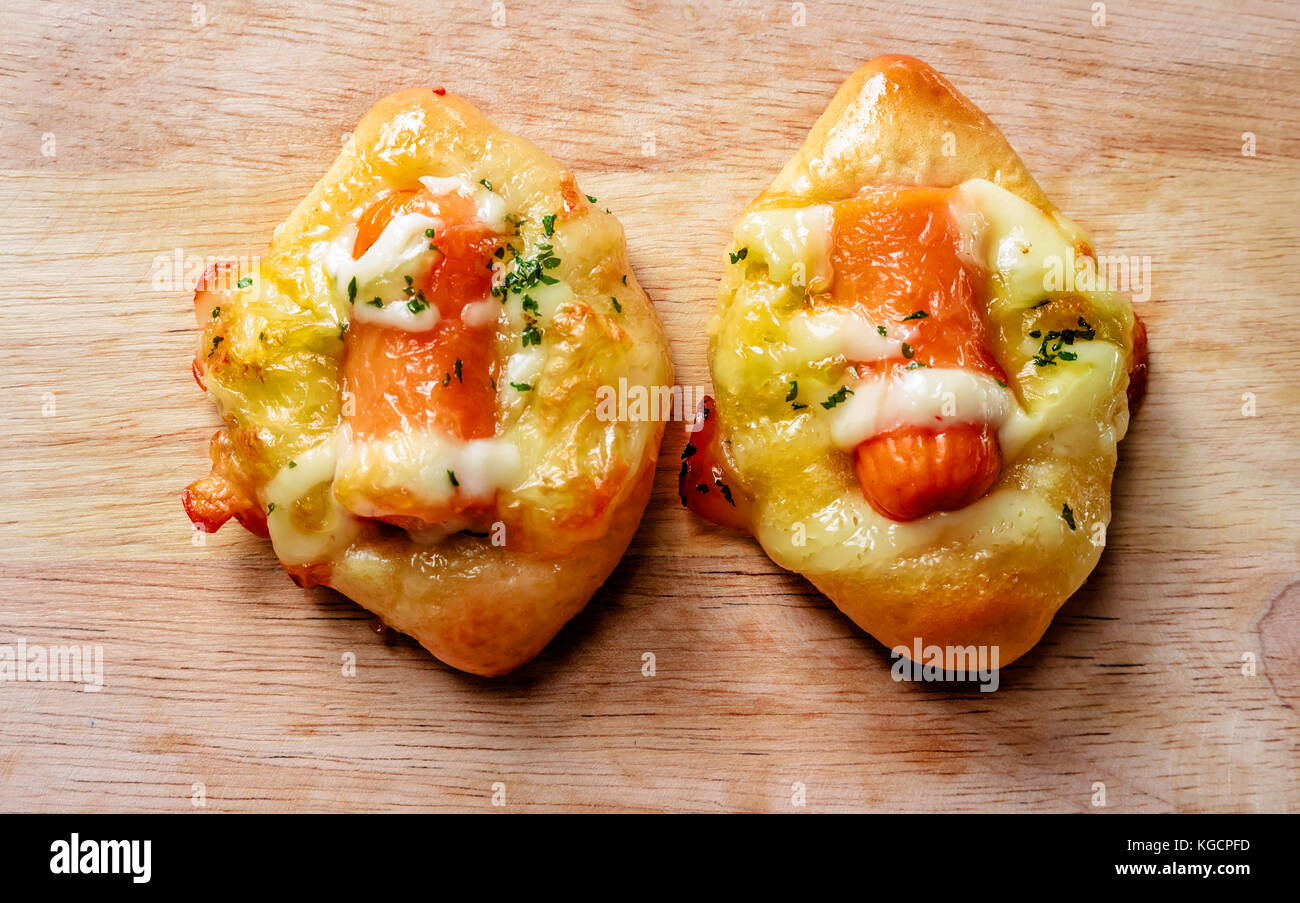 sausage tart on wood breakfast meal for child Stock Photo