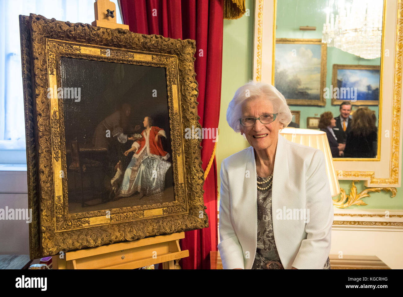 Charlotte Bischoff van Heemskerck with the seventeenth-century Dutch painting 'The Oyster Meal' by Jacob Ochtervelt, which was looted during WWII and has now been returned to her by the City of London at a ceremony at the Mansion House, London. Stock Photo