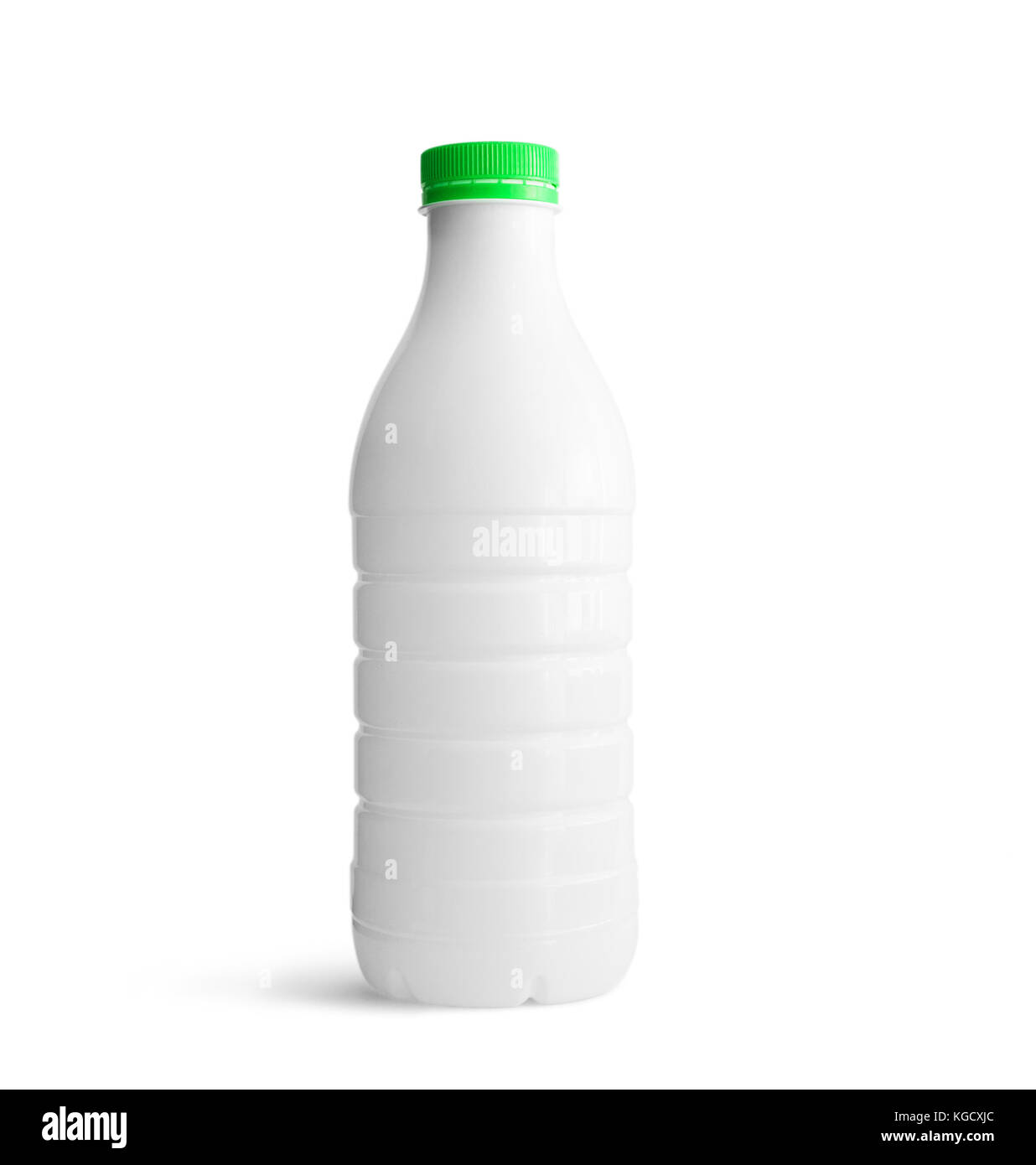 White plastic bottle with green cap isolated on white background. With clipping path Stock Photo