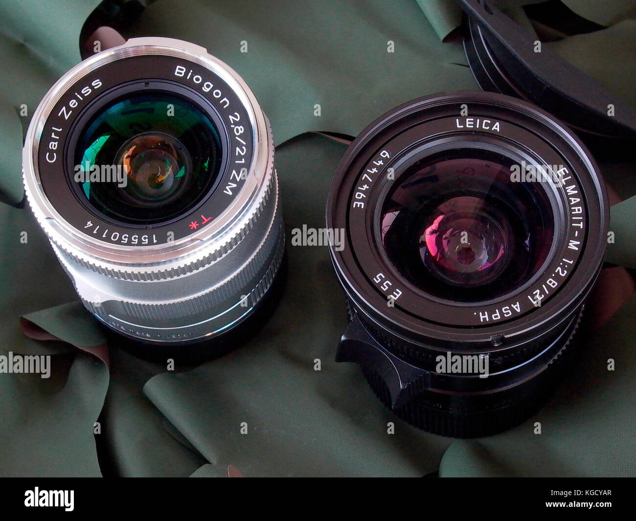 AJAXNETPHOTO. 2005. UNITED KINGDOM. CAMERA LENSES - (L-R) ZEISS BIOGON 21MM F/2.8 AND LEICA ELMARIT-M 21MM F/2.8 ASPH. PHOTO:JONATHAN EASTLAND/AJAX REF:150 Stock Photo