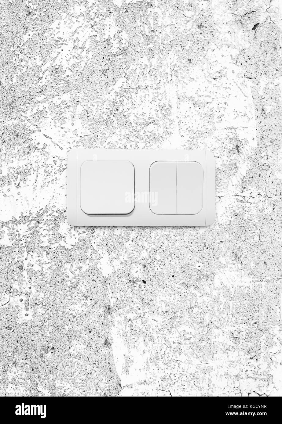 Electric switch of the three buttons on the wall. With clipping path Stock Photo