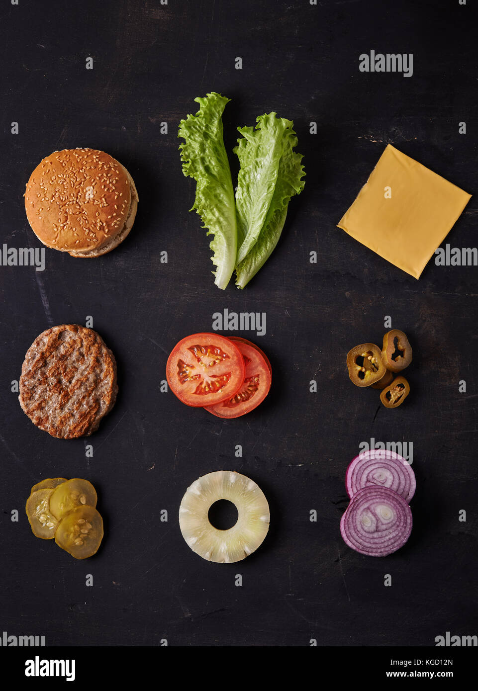 burger ingredients on dark background. top view Stock Photo - Alamy