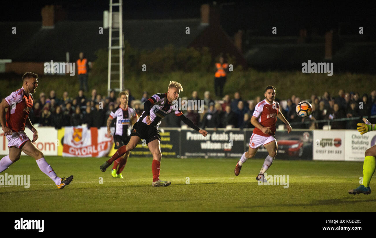 Chorley's Marcus Carver scores the opening goal during the Emirates FA Cup, First Round match at Victory Park, Chorley. Stock Photo