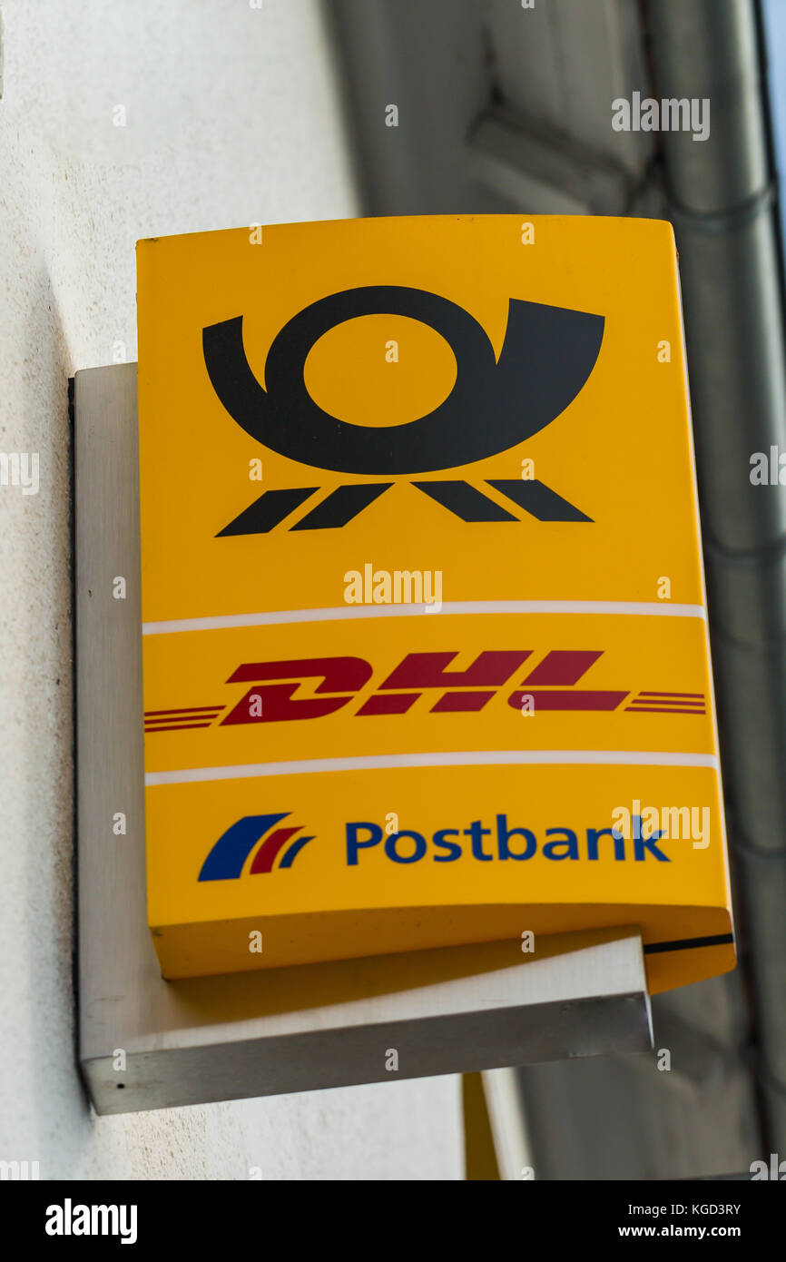 GIESSEN, GERMANY MAY, 2017: Postbank and DHL service sign on a building in GIESSEN, Germany Stock Photo