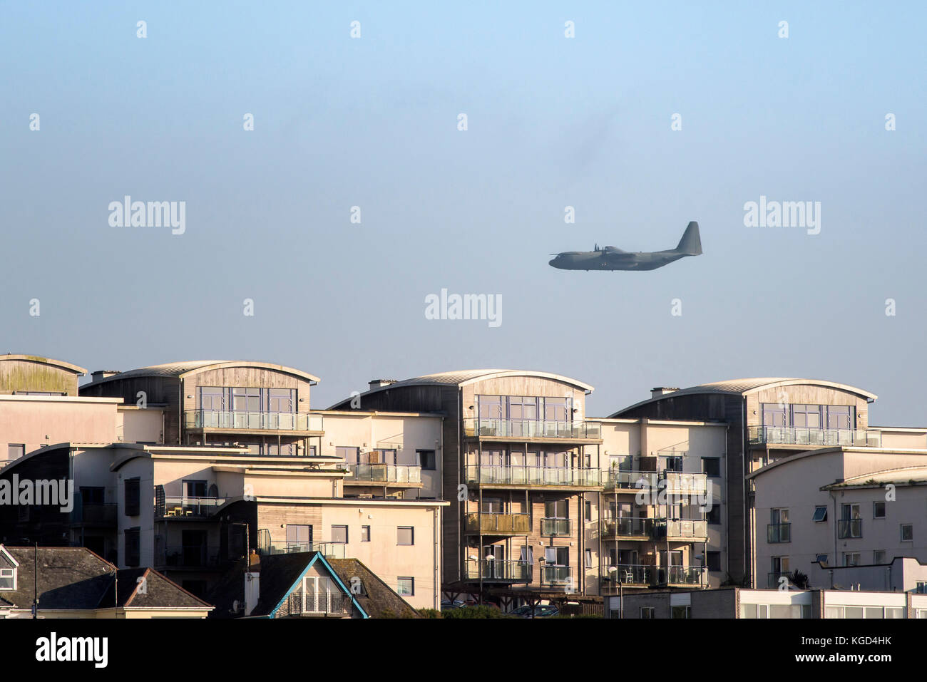 A Hercules C130 tactical transport aircraft flying over Newquay in Cornwall. Stock Photo