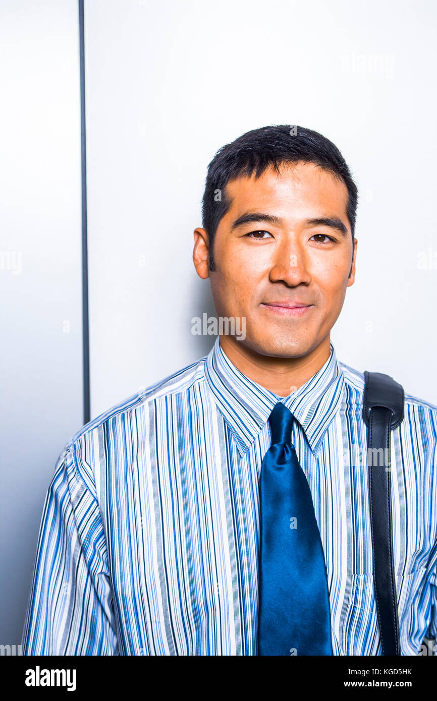 An Asian businessman portrait in a shirt and tie Stock Photo - Alamy